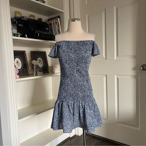 Blue and white smocked dress with a flare and off the shoulder design